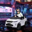 MACCHINA ELETTRICA PER BAMBINI A LICENZA LAND ROVER CON FARI CLACSON E CINTURA106X65.5X51 CM BIANCO