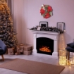 CORONA VERDE IN PVC DECORATA DA STELLE DI NATALE E PIGNE INNEVATE,DIMENSIONI DIAMETRO DI 40CM OKX