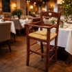 SEGGIOLONE IN LEGNO NOCE CON SEDUTA IN PAGLIA E CUORE INTAGLIATO SULLA SPALLIERA REALIZZATO IN FAGGIO 36×39×86 CM