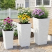 SET 3 VASI DA ESTERNO IMPILABILI CON MOTIVO ONDULATO IN PLASTICA, 42/55/65 CM, BIANCO