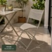 SEDIA PIEGHEVOLE DESIGN CON STRUTTURA IN ACCIAIO IN COLORAZIONE ECRU 